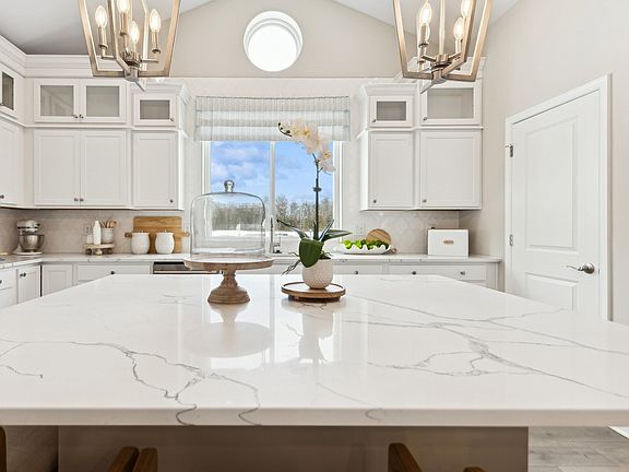 Kitchen with glass upper cabinets