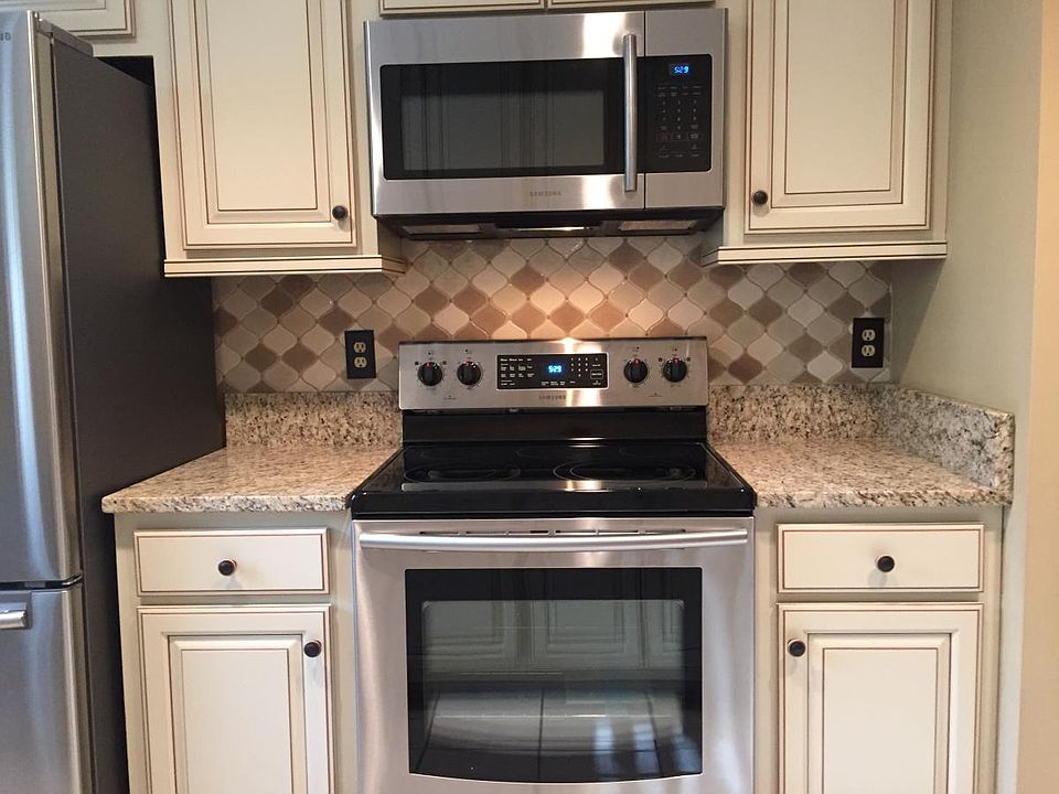 Kitchen in includes granite & Samsung Stainless Appliances
