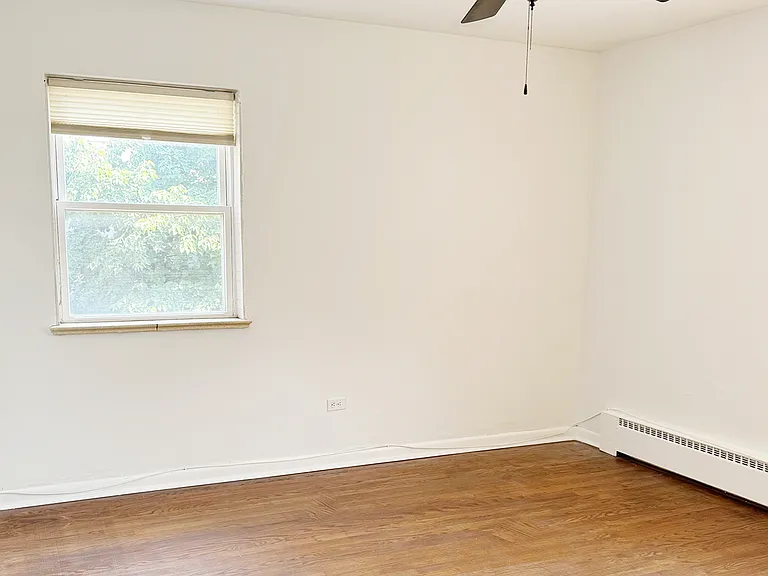2 bedrooms. Hardwood floors. Natural lighting. Freshly painted.