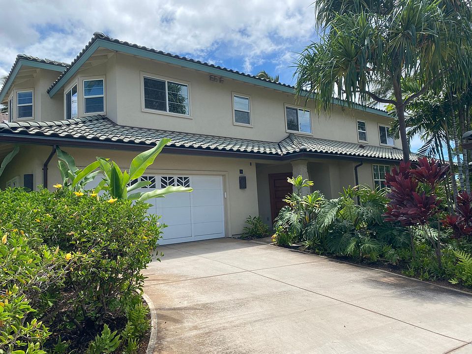 Delightful curb appeal with private driveway entrance and covered entrance to the home.