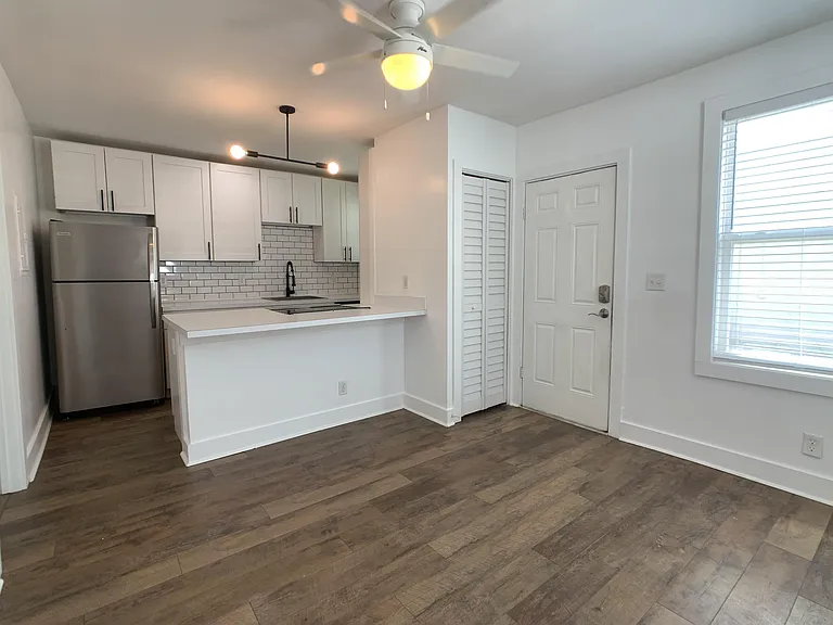 Countertop island is designed to be dining area.