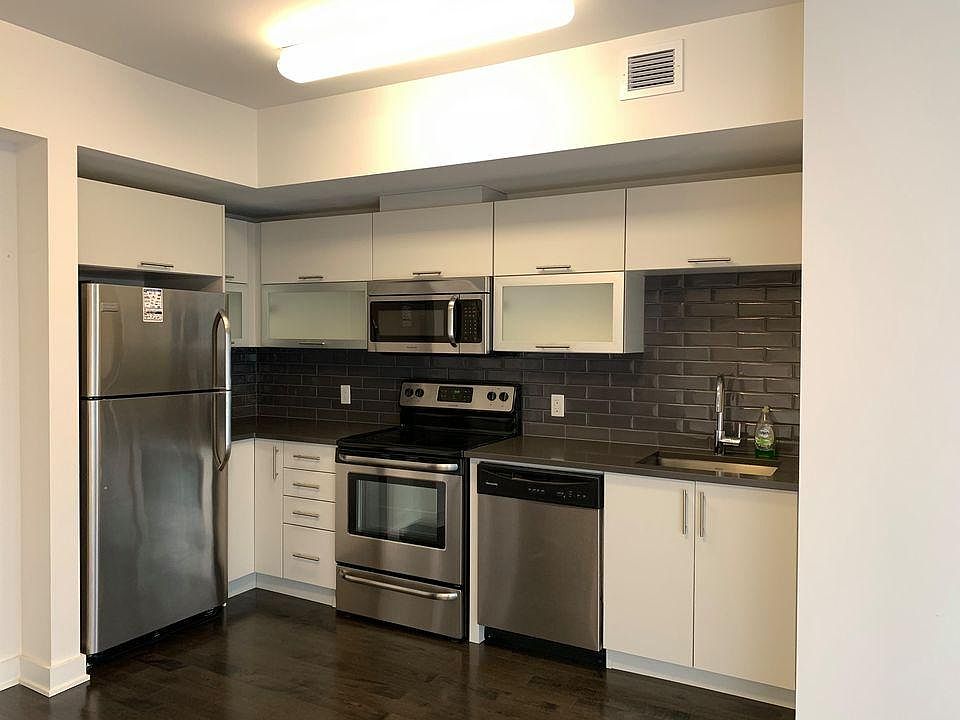 Kitchen with a few small appliances and basic utensils