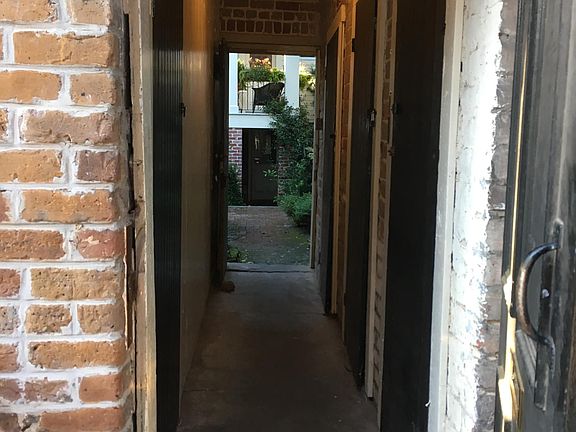 Hallway Leading from Door at Back Lane to Courtyard