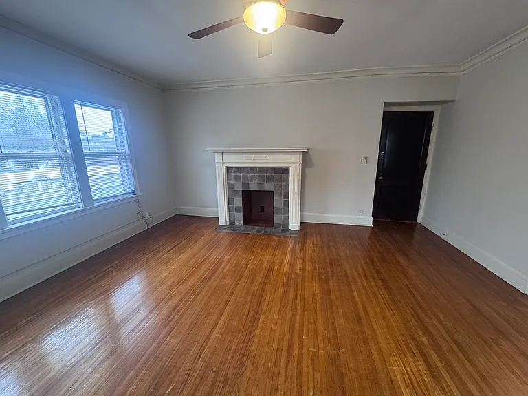 Photo from identical unit. Fireplace is painted GREEN.