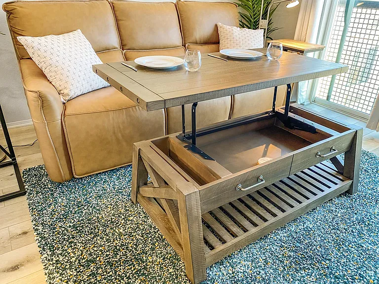 Coffee table converts to dining area