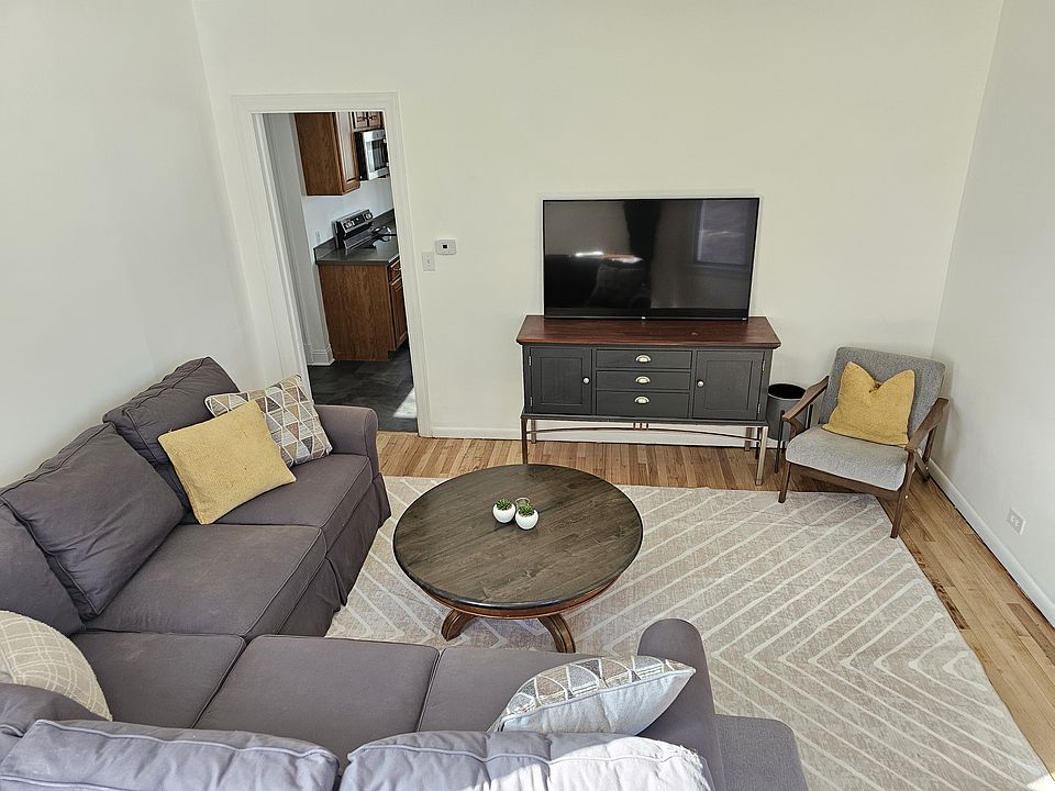 Unwind after your shift on a comfy sectional with a smart TV and fast Wi-Fi.