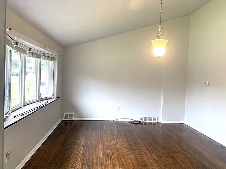 Living room is located on the middle level