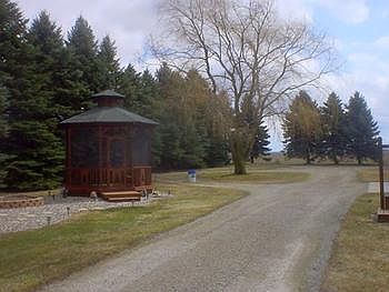 Nice Gazebo and circle drive.