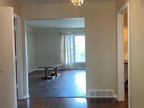 Foyer entrance with view into the living room