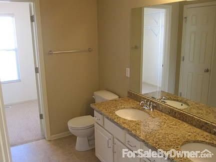 Master Bath
						:
						Master Bath with granite double sinks attached to large walk-in closet.