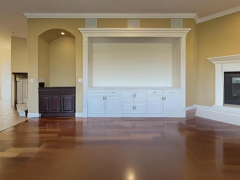 Living Room with Built in Speakers and Fireplace