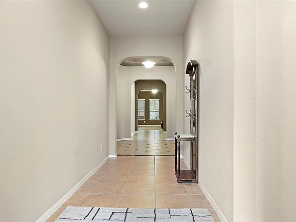 A view from the front door down the entry way.