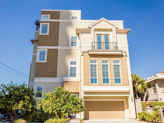 The elevation/exterior is a stucco, soft contemporary garden styled patio home.