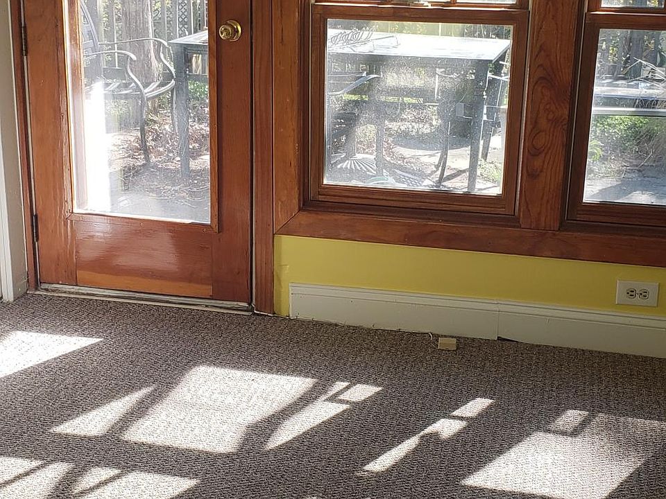 Living looking out on patio receiving afternoon light