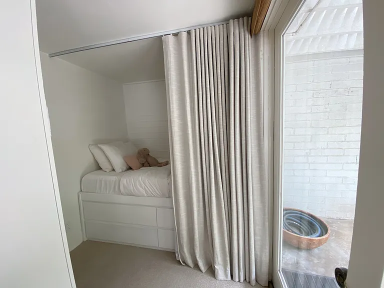 Custom sleeping alcove #1 with wardrobe storage