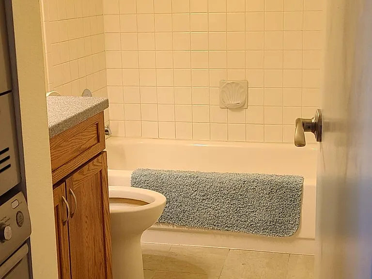 Full bathroom with tub