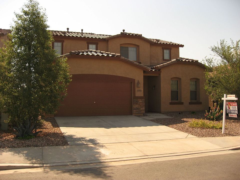 Front of House, upgraded with stacked stone. Desert Front for low maintenance.