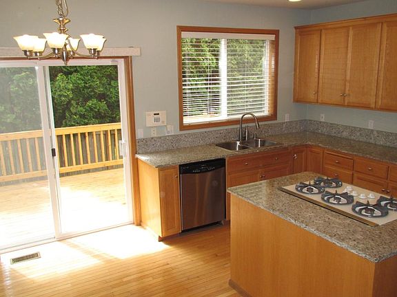 Kitchen, new granite countertops, view towards the large ced