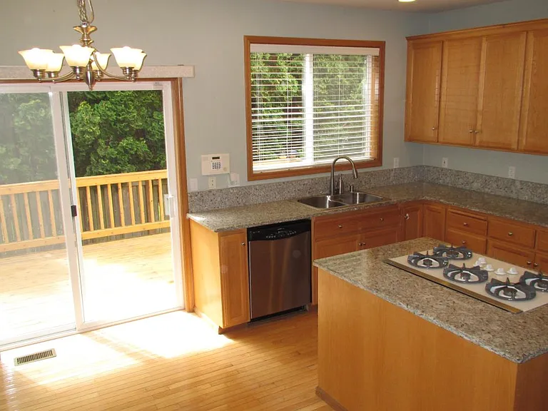 Kitchen, new granite countertops, view towards the large ced