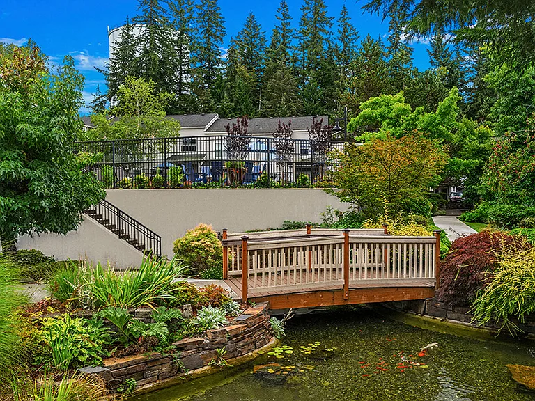Serene koi pond and walking paths located in the community