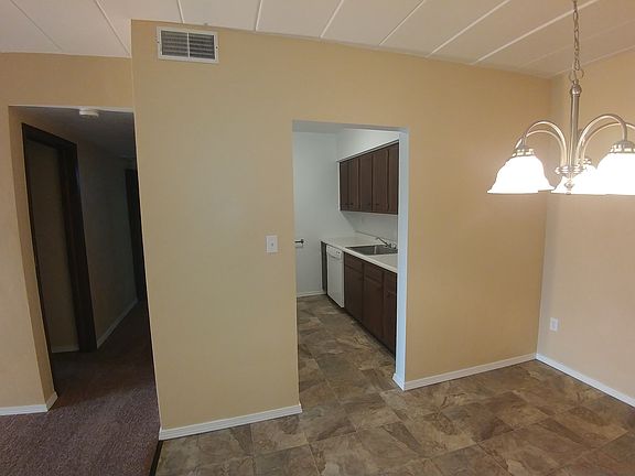 Looking into kitchen and down bedroom hallway