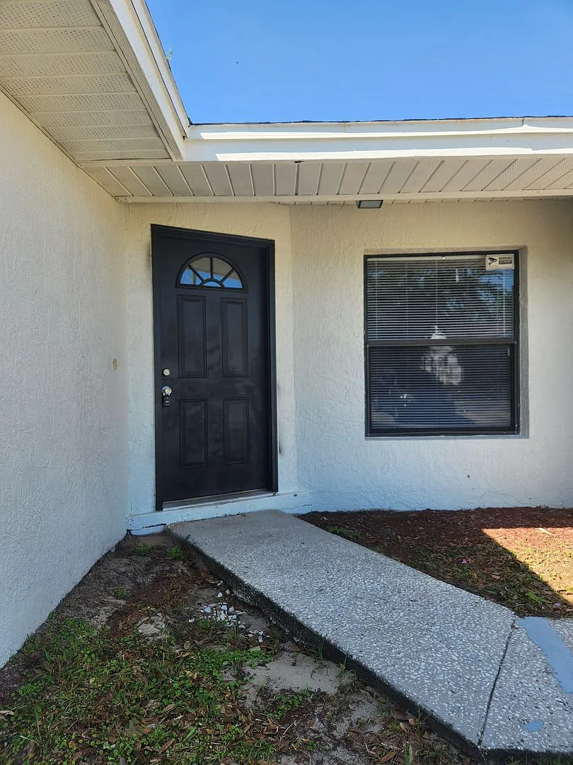 Spacious 4-Bedroom Retreat in Poinciana Now at a Reduced Price! — Photo 2