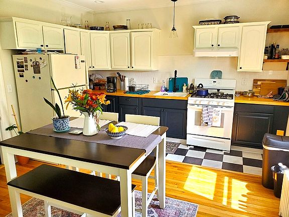 Sunny kitchen with butcherblock countertops