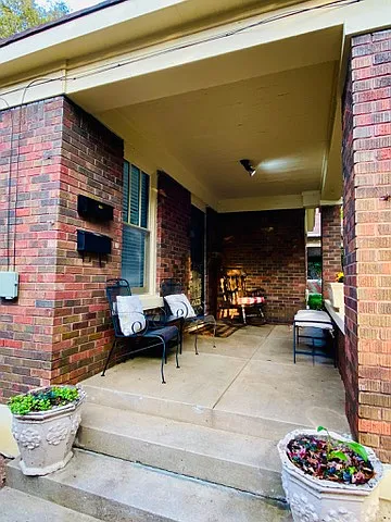Enjoy the Trees and Neighborhood from the porch.