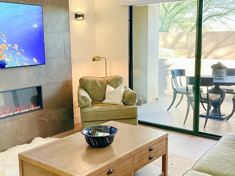 Tile patio, RH furniture, custom lighting