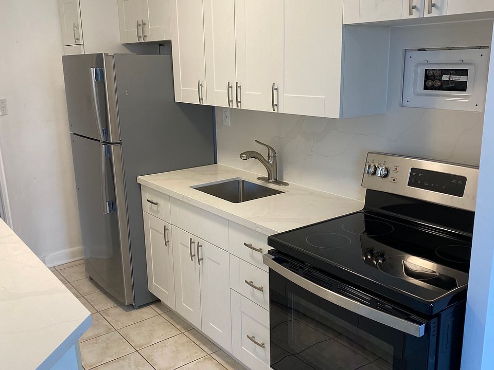 Newly renovated kitchen with stainless steel appliances.