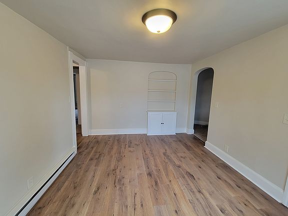 Dining Room With Built in Cabinet/Shelves