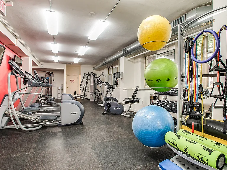 Fitness center with treadmills, machines and free weights
