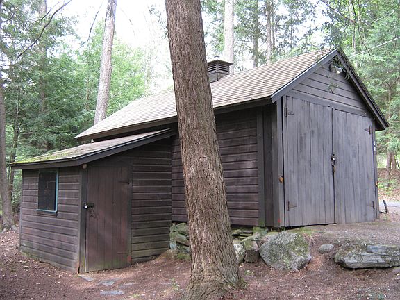 garage with attached storage shed