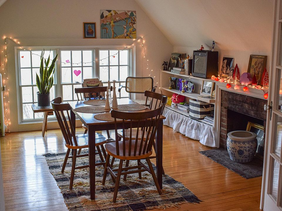 Dining room/living space/den/office with built-in shelves