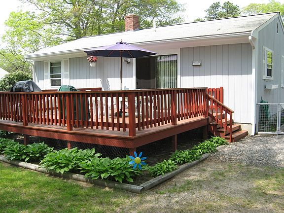 Oversized deck in private fenced yard