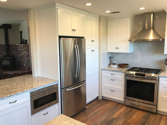 Under counter microwave, refrigerator has ice maker