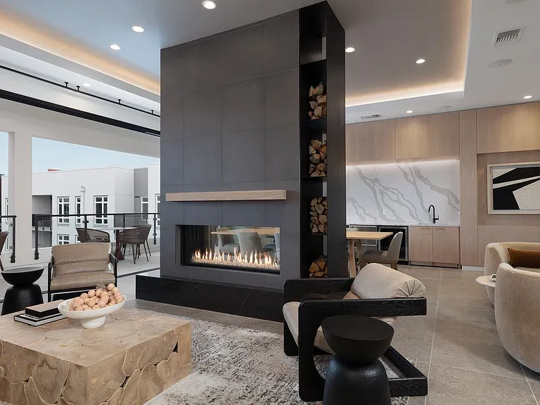 Hosting room with fireplace and multiple seating areas