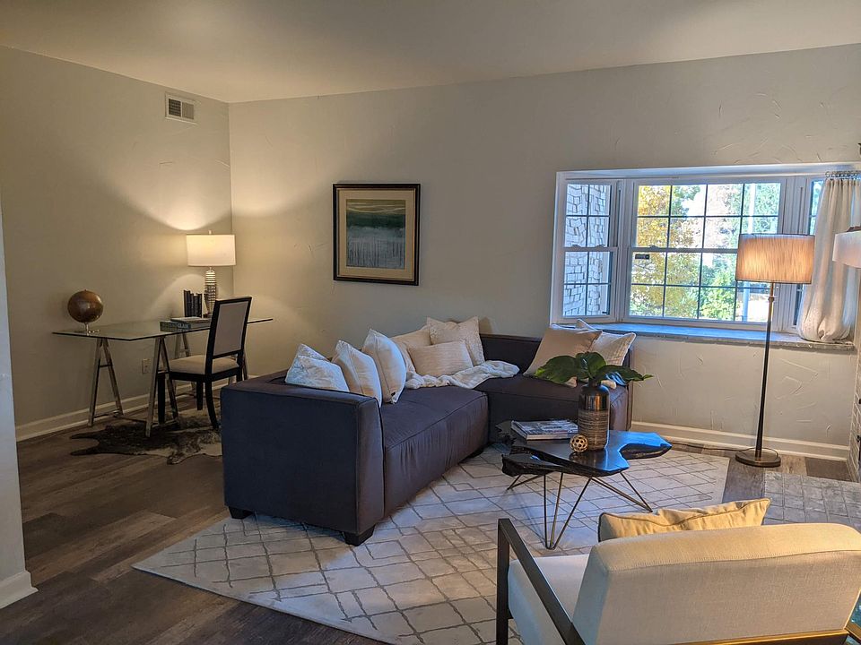 Large living area can accommodate a home office space.