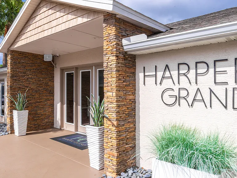 Make a great first impression at Harper Grand Apartments, where a beautifully designed clubhouse exterior sets the tone for resort-style living in Orlando, FL.