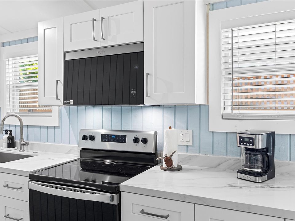 Quartz counter tops and all stainless steel appliances.