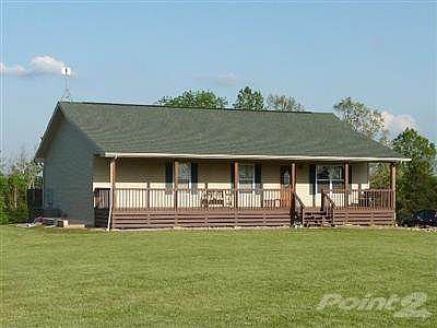 Over 3000 square feet of Living Space in this newer Secluded Ranch Home on 21 Acres.