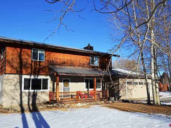 Nicely landscaped, mature Aspen, fenced back yard.