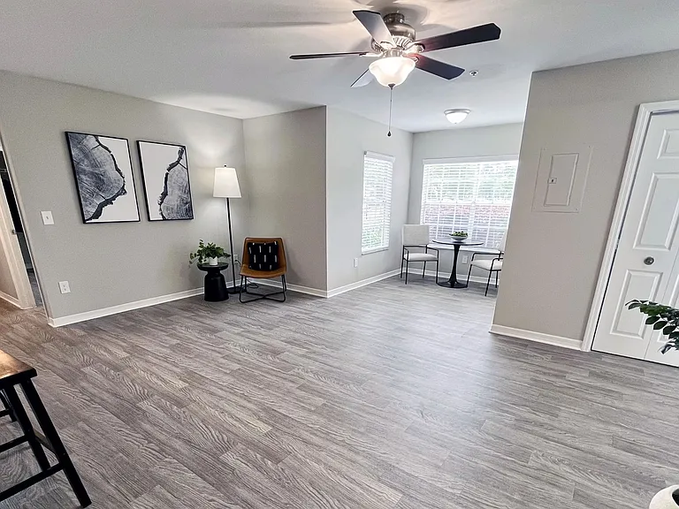 Gorgeous open living rooms with wood-style flooring and a bonus room offers the perfect space for your personal touch.
