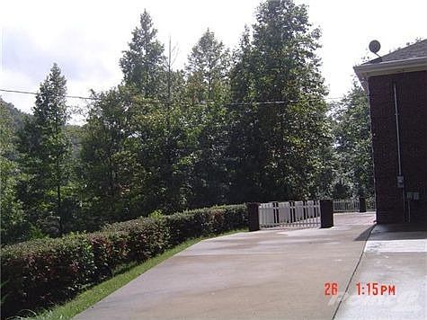 Front side view of spacious front patio at entrance