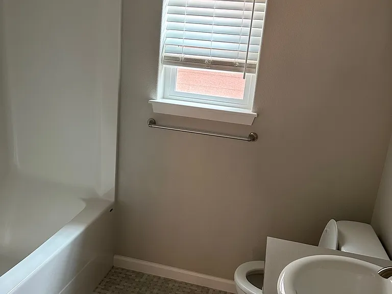 Full bathroom upstairs with tub+shower and 2 sinks.