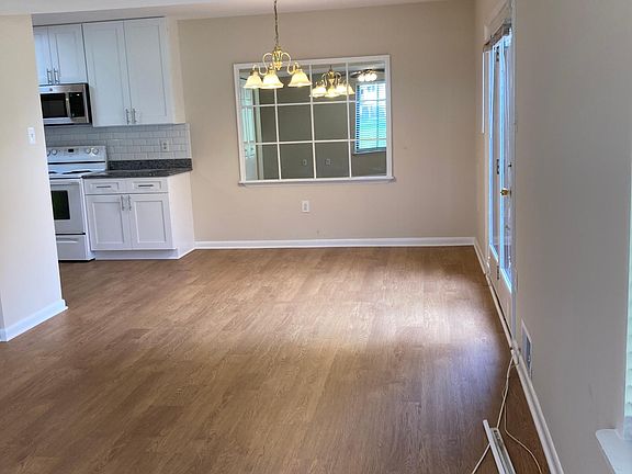Living room and dining area that opens to kitchen