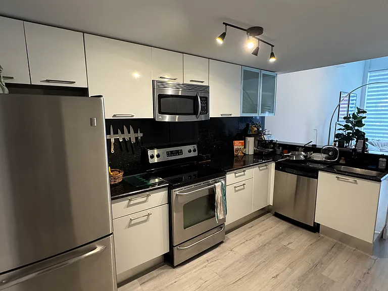 Kitchen - Open concept kitchen featuring ample counter-space and storage for the cook in your life. Airy feel that is perfect for entertaining or everyday ease.