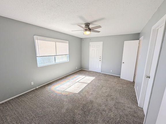 Master bedroom w/ backdoor.