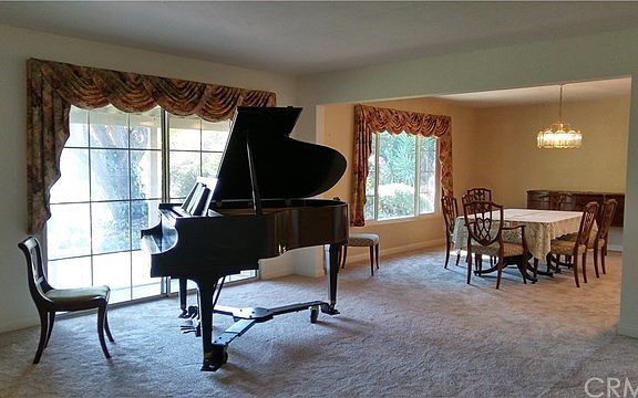 The view from the living room and dining room is of the park like property.