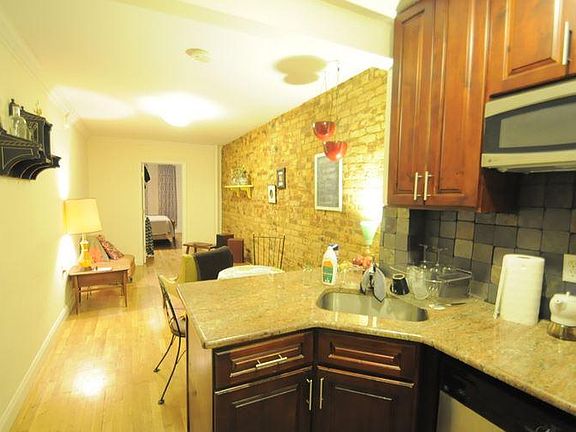 2nd image of 209 E 5th St APT 1